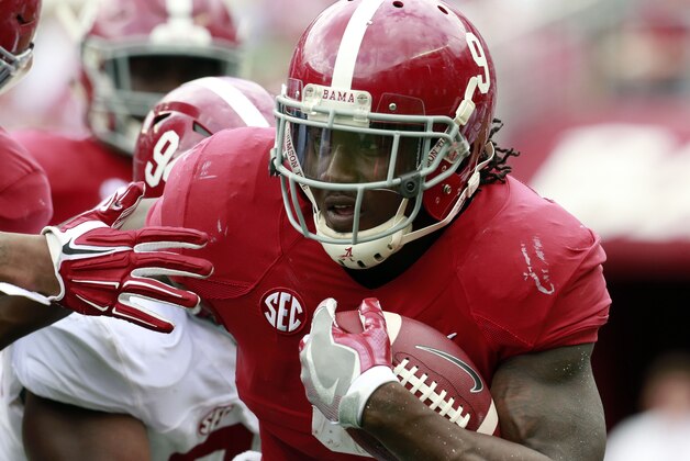 Apr 16, 2016; Tuscaloosa, AL, USA; Alabama Crimson Tide running back Bo Scarbrough (9) carries the ball during the annual A-day game at Bryant-Denny Stadium. Mandatory Credit: Marvin Gentry-USA TODAY Sports