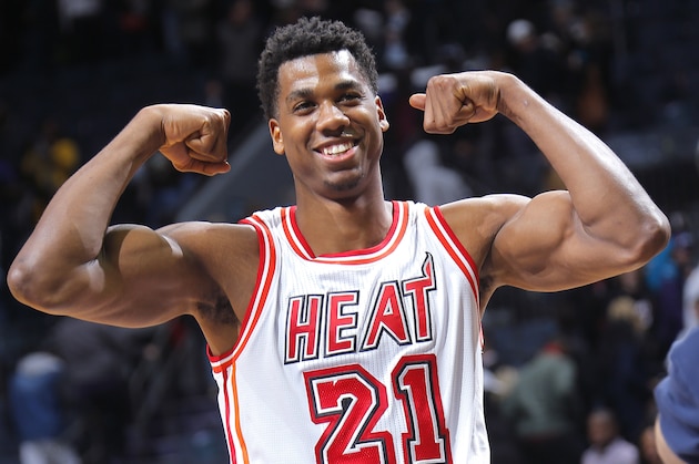 CHARLOTTE, NC - FEBRUARY 5: Hassan Whiteside #21 of the Miami Heat flexes during the game against the Charlotte Hornets on February 5, 2016 at Time Warner Cable Arena in Charlotte, North Carolina. NOTE TO USER: User expressly acknowledges and agrees that, by downloading and or using this Photograph, user is consenting to the terms and condition of the Getty Images License Agreement.  (Photo by Rocky W. Widner/Getty Images)