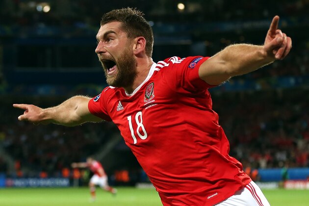 LILLE, FRANCE - JULY 01: Sam Vokes of Wales celebrates scoring his side's third goal during the UEFA Euro 2016 Quarter Final match between Wales and Belgium at Stade Pierre-Mauroy on July 1, 2016 in Lille, France. (Photo by Chris Brunskill Ltd/Getty Images)