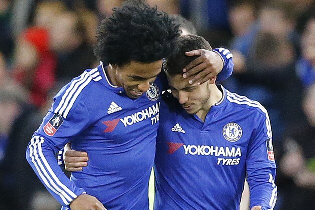 Chelsea's Willian, left, and Chelsea's Eden Hazard celebrate after scoring during the English FA Cup soccer match between Chelsea and Manchester City at the Stamford Bridge stadium in London, Sunday, Feb. 21, 2016.(AP Photo/Frank Augstein)