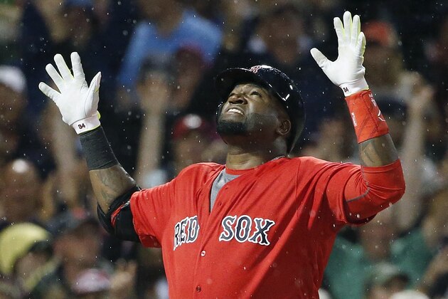 Boston Red Sox's David Ortiz celebrates his solo home run during the fifth inning of a baseball game against the Los Angeles Angels in Boston, Friday, July 1, 2016. (AP Photo/Michael Dwyer)