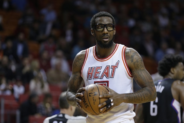 Miami Heat forward Amare Stoudemire stands with the ball during the first half of an NBA basketball game against the Los Angeles Clippers, Sunday, Feb. 7, 2016, in Miami. (AP Photo/Lynne Sladky)