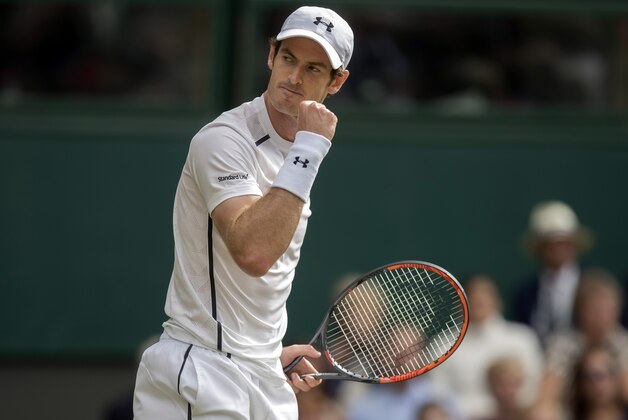 Jun 30, 2016; London, United Kingdom; Andy Murray (GBR) reacts during his match against Yen-Hsun Lu (TPE) on day four of the 2016 The Championships Wimbledon. Mandatory Credit: Susan Mullane-USA TODAY Sports