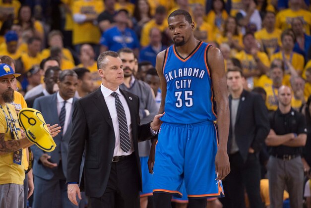 May 30, 2016; Oakland, CA, USA; Oklahoma City Thunder head coach Billy Donovan (left) instructs forward Kevin Durant (35) during the fourth quarter in game seven of the Western conference finals of the NBA Playoffs against the Golden State Warriors at Oracle Arena. The Warriors defeated the Thunder 96-88. Mandatory Credit: Kyle Terada-USA TODAY Sports