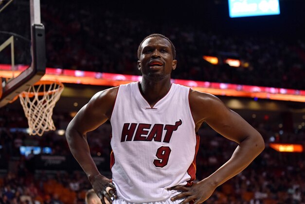 Apr 10, 2016; Miami, FL, USA; Miami Heat forward Luol Deng (9) reacts after drawing a foul during the first half against the Orlando Magic at American Airlines Arena. Mandatory Credit: Steve Mitchell-USA TODAY Sports