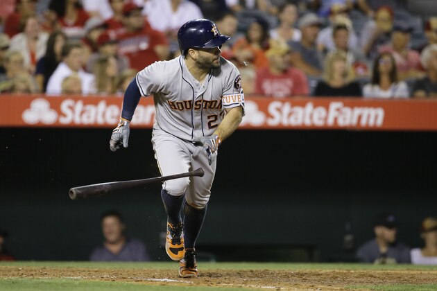 Houston Astros' Jose Altuve watches his hit for a single during the seventh inning of a baseball game against the Los Angeles Angels Tuesday, June 28, 2016, in Anaheim, Calif. (AP Photo/Gregory Bull)