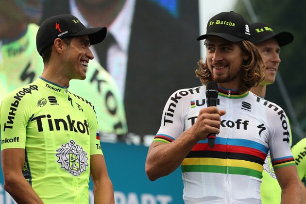SAINTE-MERE-EGLISE, FRANCE - JUNE 30:  Alberto Contador of Spain (L) and Peter Sagan of Slovakia riding for Tinkoff talk on stage during the team presentation ahead of the 2016 Le Tour de France on June 30, 2016 in Sainte-Mere-Eglise, France.  (Photo by Chris Graythen/Getty Images)