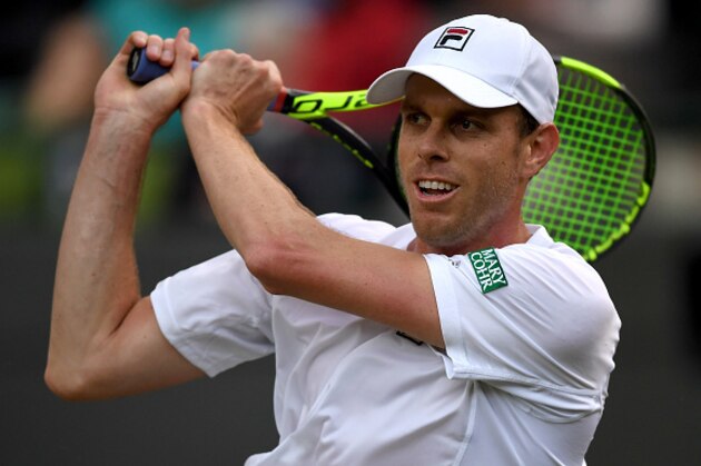 LONDON, ENGLAND - JULY 01:  Sam Querrey of The United States plays a backhand during the Men's Singles third round match against Novak Djokovic of Serbia on day five of the Wimbledon Lawn Tennis Championships at the All England Lawn Tennis and Croquet Club on July 1, 2016 in London, England.  (Photo by Shaun Botterill/Getty Images)