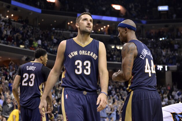 New Orleans Pelicans forward Ryan Anderson (33) stands on the court between forwards Anthony Davis (23) and Dante Cunningham (44) in overtime of an NBA basketball game Friday, March 11, 2016, in Memphis, Tenn. (AP Photo/Brandon Dill)