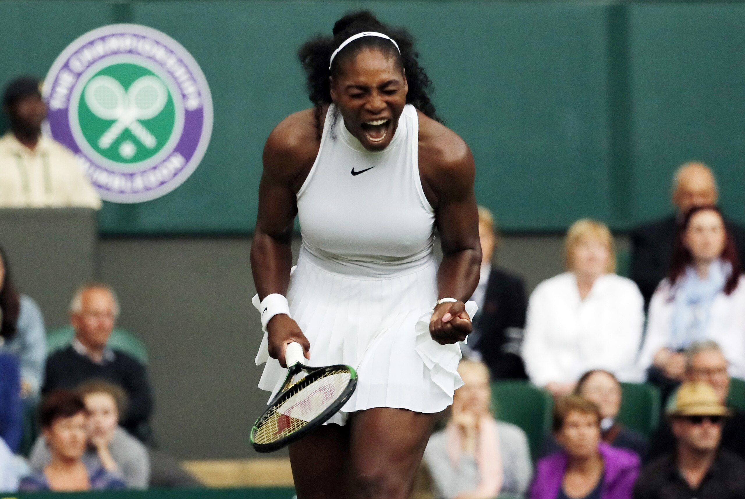 Serena Williams of the U.S celebrates a point against Christina McHale of the U.S during their women's singles match on day five of the Wimbledon Tennis Championships in London, Friday, July 1, 2016. (AP Photo/Ben Curtis)