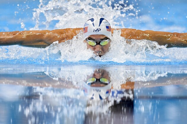 Michael Phelps swims in the men’s 100-meter butterfly semifinal at the U.S. Olympic swimming trials, Friday, July 1, 2016, in Omaha, Neb. (AP Photo/Mark J. Terrill)