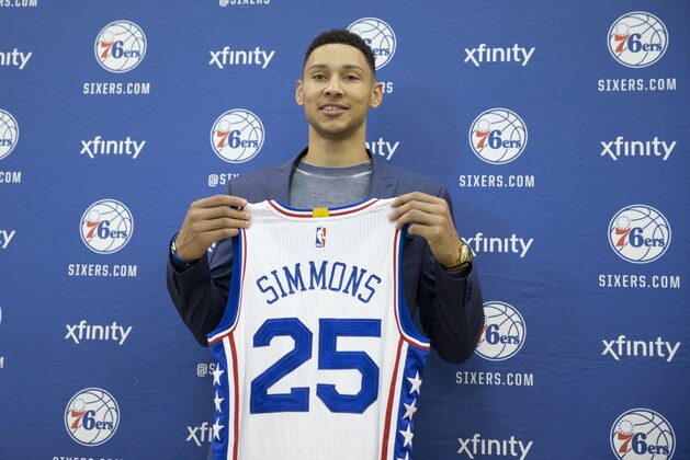 Philadelphia 76ers NBA basketball draft pick Ben Simmons poses for photographs during a news conference in Philadelphia, Friday, June 24, 2016. (AP Photo/Matt Rourke)