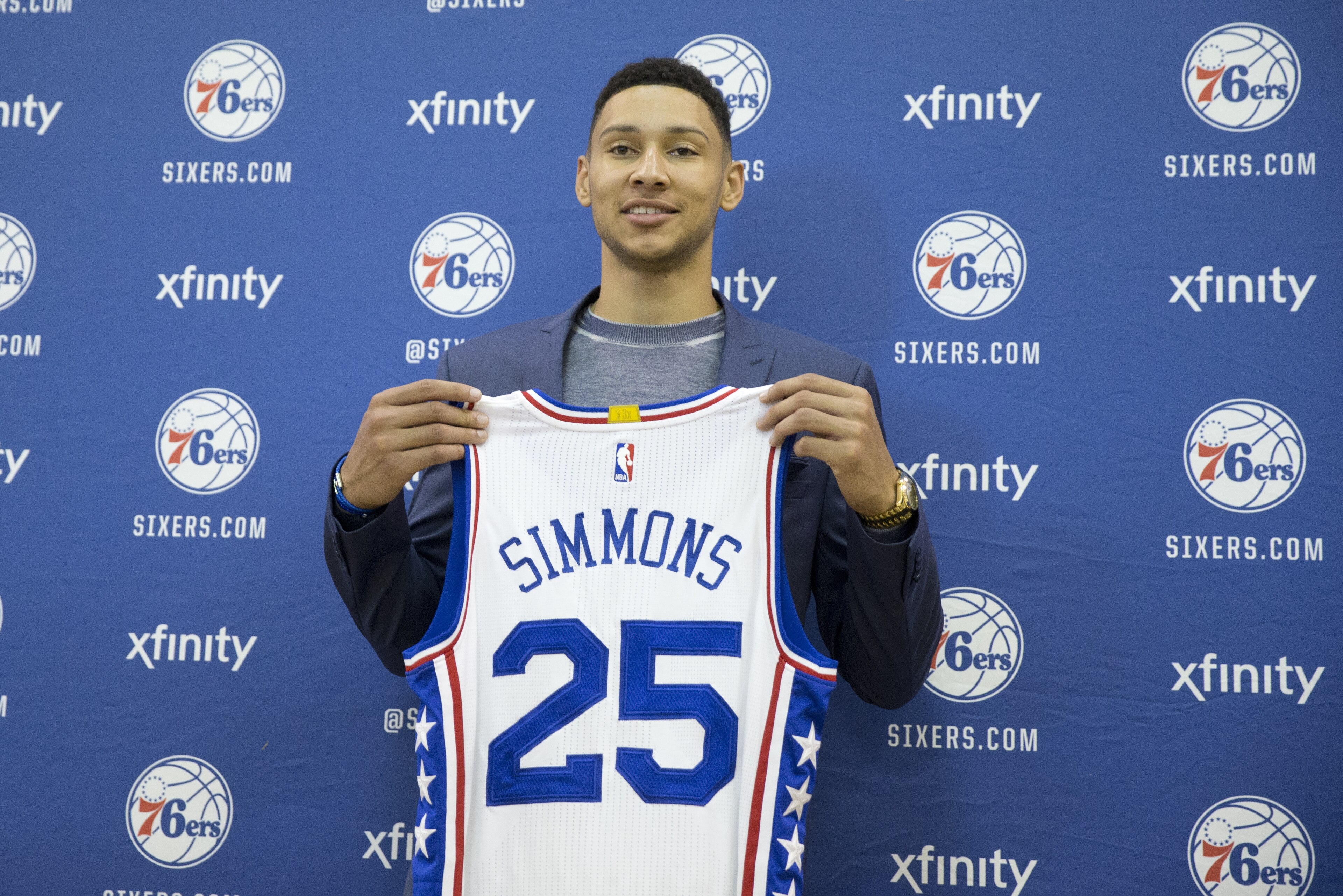 Philadelphia 76ers NBA basketball draft pick Ben Simmons poses for photographs during a news conference in Philadelphia, Friday, June 24, 2016. (AP Photo/Matt Rourke)