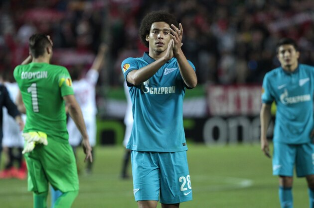 Zenit's Axel Witsel applauds at the end of the match against Sevilla during a quarterfinal first leg Europa League soccer match between Sevilla and Zenit St.Petersburg at the Ramon Sanchez Pizjuan stadium in Seville, Spain, Thursday April 16, 2015. Sevilla won 2-1 (AP Photo/Angel Fernandez)