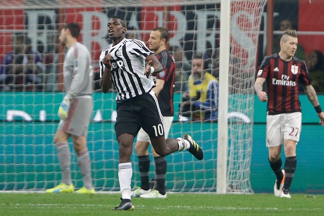 Juventus' Paul Pogba celebrates after scoring during a Serie A soccer match between AC Milan and Juventus, at the San Siro stadium in Milan, Italy, Saturday, April 9, 2016. (AP Photo/Luca Bruno)