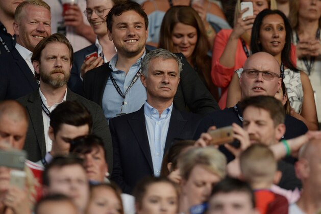 Manchester United's new coach Jose Mourinho (C) arrives for the Soccer Aid charity football match between England and the Rest of the World at Old Trafford stadium in Manchester on June 5, 2016. / AFP / OLI SCARFF        (Photo credit should read OLI SCARFF/AFP/Getty Images)
