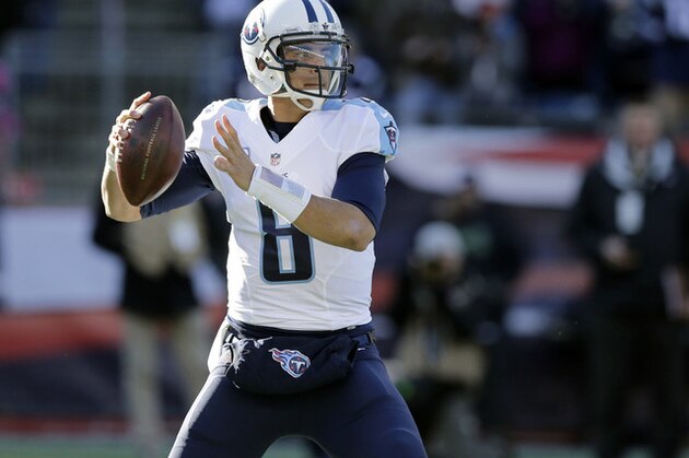 Tennessee Titans quarterback Marcus Mariota (8) passes against the New England Patriots in the first half of an NFL football game, Sunday, Dec. 20, 2015, in Foxborough, Mass. (AP Photo/Charles Krupa)