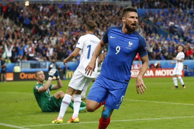 France's Olivier Giroud celebrates after scoring his side's first goal during the Euro 2016 quarterfinal soccer match between France and Iceland, at the Stade de France in Saint-Denis, north of Paris, France, Sunday, July 3, 2016. (AP Photo/Thibault Camus)