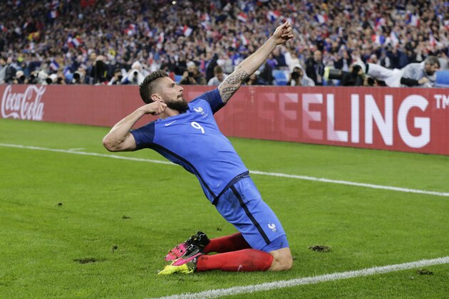 France's Olivier Giroud celebrates after scoring his side's fifth goal during the Euro 2016 quarterfinal soccer match between France and Iceland, at the Stade de France in Saint-Denis, north of Paris, France, Sunday, July 3, 2016. (AP Photo/Petr David Josek)