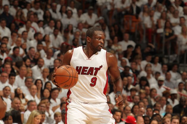 MIAMI, FL - MAY 13:  Luol Deng #9 of the Miami Heat handles the ball against the Toronto Raptors in Game Six of the Eastern Conference Semifinals during the 2016 NBA Playoffs on May 13, 2016 at AmericanAirlines Arena in Miami, Florida. NOTE TO USER: User expressly acknowledges and agrees that, by downloading and or using this Photograph, user is consenting to the terms and conditions of the Getty Images License Agreement. Mandatory Copyright Notice: Copyright 2016 NBAE (Photo by Issac Baldizon/NBAE via Getty Images)