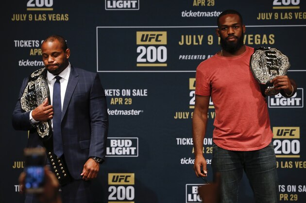 NEW YORK, NY - APRIL 27:  Daniel Cormier (L) and Jon Jones pose for a photo after squaring off during a media availability for UFC 200 at Madison Square Garden on April 27, 2016 in New York City. (Photo by Jeff Zelevansky/Getty Images)