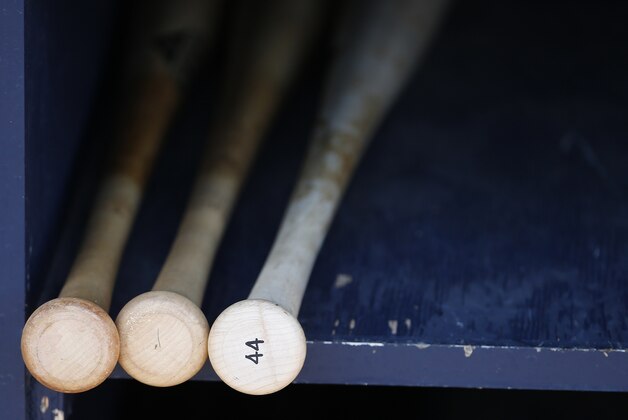 A selection of bats for Arizona Diamondbacks' Paul Goldschmidt are ready in the visiting dugout prior to a spring training baseball game against the San Diego Padres Tuesday, March 8, 2016, in Peoria, Ariz. (AP Photo/Ross D. Franklin)