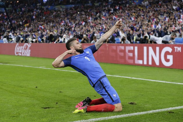 France's Olivier Giroud celebrates after scoring his side's fifth goal during the Euro 2016 quarterfinal soccer match between France and Iceland, at the Stade de France in Saint-Denis, north of Paris, France, Sunday, July 3, 2016. (AP Photo/Petr David Josek)