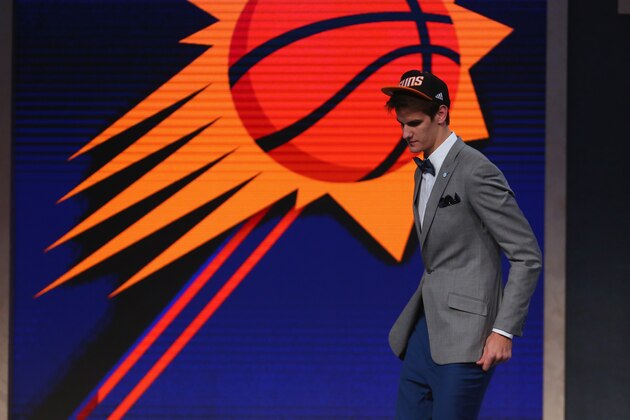 NEW YORK, NY - JUNE 23:  Dragan Bender walks off stage after being drafted fourth overall by the Phoenix Suns in the first round of the 2016 NBA Draft at the Barclays Center on June 23, 2016 in the Brooklyn borough of New York City. NOTE TO USER: User expressly acknowledges and agrees that, by downloading and or using this photograph, User is consenting to the terms and conditions of the Getty Images License Agreement.  (Photo by Mike Stobe/Getty Images)