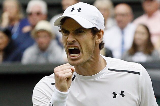 Andy Murray of Britain celebrates a point against Nick Kyrgios of Australia during their men's singles match on day eight of the Wimbledon Tennis Championships in London, Monday, July 4, 2016. (AP Photo/Kirsty Wigglesworth)