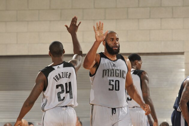 ORLANDO, FL - JULY 4:  Arinze Onuaku #50 of the Orlando Magic White high fives Michael Frazier #24 of the Orlando Magic White against the Dallas Mavericks during the Orlando Summer League on July 4, 2016 at Amway Center in Orlando, Florida. NOTE TO USER: User expressly acknowledges and agrees that, by downloading and or using this photograph, User is consenting to the terms and conditions of the Getty Images License Agreement. Mandatory Copyright Notice: Copyright 2016 NBAE (Photo by Fernando Medina/NBAE via Getty Images)