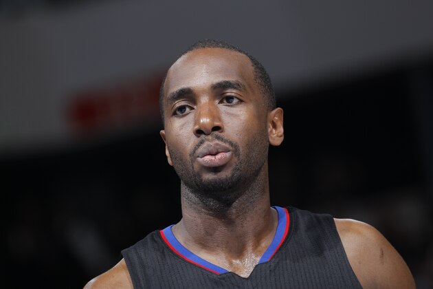 SACRAMENTO, CA - FEBRUARY 26: Luc Mbah a Moute #12 of the Los Angeles Clippers looks on during the game against the Sacramento Kings on February 26, 2016 at Sleep Train Arena in Sacramento, California. NOTE TO USER: User expressly acknowledges and agrees that, by downloading and or using this photograph, User is consenting to the terms and conditions of the Getty Images Agreement. Mandatory Copyright Notice: Copyright 2016 NBAE (Photo by Rocky Widner/NBAE via Getty Images)