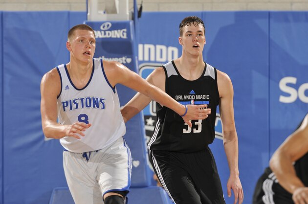 ORLANDO, FL - JULY 4:  Henry Ellenson #8 of the Detroit Pistons and Stephen Zimmerman #33 of the Orlando Magic Blue during the Orlando Summer League on July 4, 2016 at Amway Center in Orlando, Florida. NOTE TO USER: User expressly acknowledges and agrees that, by downloading and or using this photograph, User is consenting to the terms and conditions of the Getty Images License Agreement. Mandatory Copyright Notice: Copyright 2016 NBAE (Photo by Fernando Medina/NBAE via Getty Images)