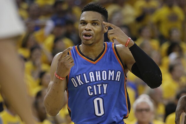 Oklahoma City Thunder guard Russell Westbrook (0) gestures toward an official during the second half of Game 7 of the NBA basketball Western Conference finals against the Golden State Warriors in Oakland, Calif., Monday, May 30, 2016. (AP Photo/Marcio Jose Sanchez)