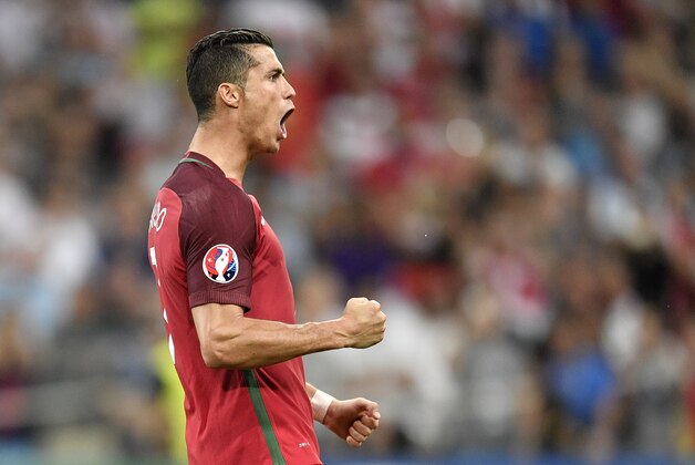 Portugal's Cristiano Ronaldo celebrates after scoring from the penalty spot during the Euro 2016 quarterfinal soccer match between Poland and Portugal, at the Velodrome stadium in Marseille, France, Thursday, June 30, 2016. (AP Photo/Martin Meissner)