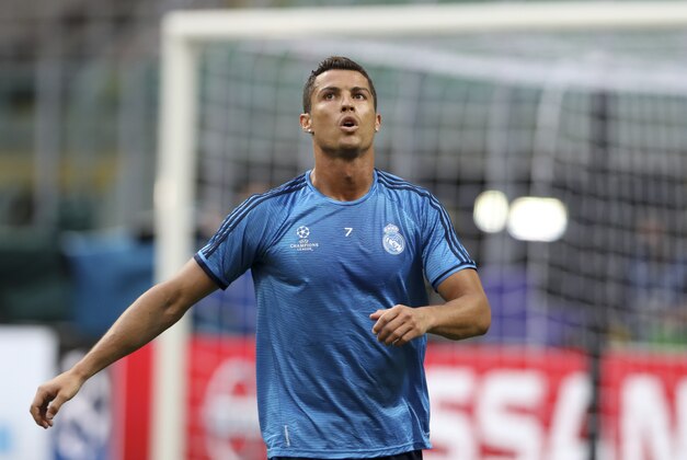Real Madrid's Cristiano Ronaldo looks up during a training session at the San Siro stadium in Milan, Italy, Friday, May 27, 2016. The Champions League final soccer match between Real Madrid and Atletico Madrid will be held at the San Siro stadium on Saturday, May 28. (AP Photo/Luca Bruno)