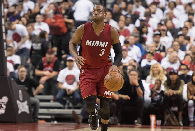 May 15, 2016; Toronto, Ontario, CAN; Miami Heat guard Dwyane Wade (3) dribbles the ball up court during the second quarter in game seven of the second round of the NBA Playoffs against the Toronto Raptors at Air Canada Centre. The Toronto Raptors won 116-89. Mandatory Credit: Nick Turchiaro-USA TODAY Sports
