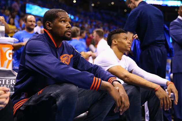 OKLAHOMA CITY, OK - MAY 28:  Kevin Durant #35 of the Oklahoma City Thunder and Russell Westbrook #0 look on prior to game six of the Western Conference Finals against the Golden State Warriors during the 2016 NBA Playoffs at Chesapeake Energy Arena on May 28, 2016 in Oklahoma City, Oklahoma. NOTE TO USER: User expressly acknowledges and agrees that, by downloading and or using this photograph, User is consenting to the terms and conditions of the Getty Images License Agreement.  (Photo by Maddie Meyer/Getty Images)