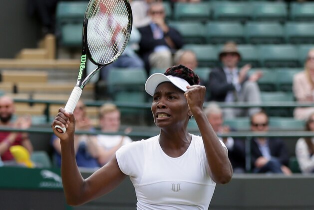 Venus Williams of the U.S celebrates after beating Yaroslava Shvedova of Kazahkstan in their women's singles match on day nine of the Wimbledon Tennis Championships in London, Tuesday, July 5, 2016. (AP Photo/Tim Ireland)
