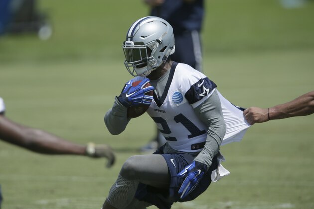 Dallas Cowboys running back Ezekiel Elliott (21) takes part in drills during the NFL football team's minicamp at Valley Ranch in Irving, Texas, Wednesday, June 15, 2016. (AP Photo/LM Otero)
