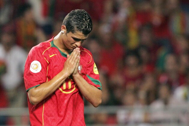 LISBON, Portugal:  Portuguese forward Cristiano Ronaldo rues a missed opportunity, 04 July 2004 at the Luz stadium in Lisbon, during the Euro 2004 final match between Portugal and Greece at the European Nations football championship in Portugal.   AFP PHOTO ARIS MESSINIS  (Photo credit should read ARIS MESSINIS/AFP/Getty Images)