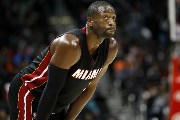 FILE - In this Oct. 18, 2015, file photo, Miami Heat guard Dwyane Wade (3) looks up during the first half of a preseason NBA basketball game against the Atlanta Hawks in Atlanta. Wade took to Twitter on Monday, May 2, 2016, after hearing Prince’s comment in a 2012 Australian radio interview that he was the late pop icon's favorite player. (AP Photo/Todd Kirkland, File)