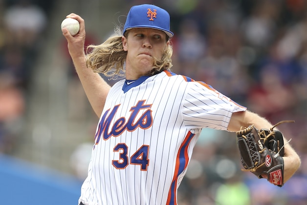 New York Mets starting pitcher Noah Syndergaard throws during the second inning of a baseball game against the Chicago Cubs, Sunday, July 3, 2016, in New York. (AP Photo/Seth Wenig)