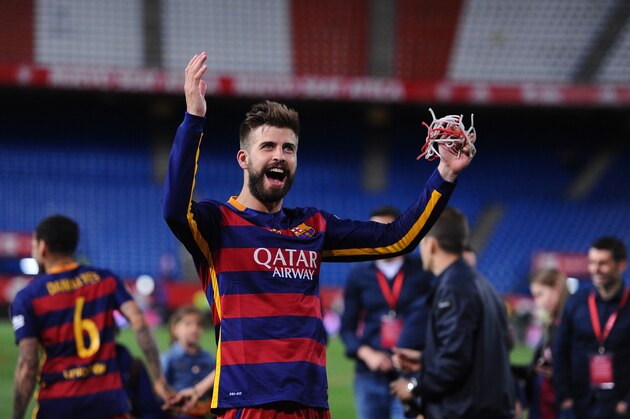 MADRID, SPAIN - MAY 22:  Gerard Pique of FC Barcelona celebrates after his team beat Sevilla 2-0 in the Copa del Rey Final between Barcelona and Sevilla at Vicente Calderon Stadium    on May 22, 2016 in Madrid, Spain.  (Photo by Denis Doyle/Getty Images)