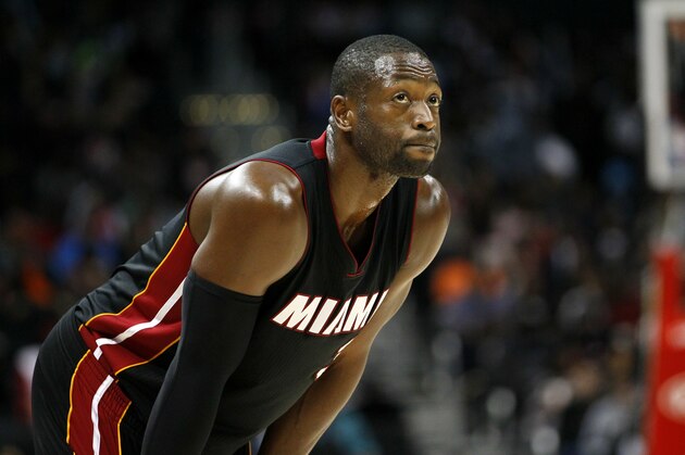 FILE - In this Oct. 18, 2015, file photo, Miami Heat guard Dwyane Wade (3) looks up during the first half of a preseason NBA basketball game against the Atlanta Hawks in Atlanta. Wade took to Twitter on Monday, May 2, 2016, after hearing Prince’s comment in a 2012 Australian radio interview that he was the late pop icon's favorite player. (AP Photo/Todd Kirkland, File)