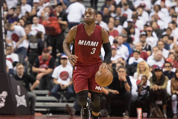 May 15, 2016; Toronto, Ontario, CAN; Miami Heat guard Dwyane Wade (3) dribbles the ball up court during the second quarter in game seven of the second round of the NBA Playoffs against the Toronto Raptors at Air Canada Centre. The Toronto Raptors won 116-89. Mandatory Credit: Nick Turchiaro-USA TODAY Sports