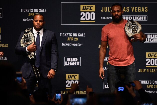 NEW YORK, NY - APRIL 27:  (L-R) Daniel Cormier and Jon Jones face off for the media and fans during the UFC 200 New York press event at Madison Square Garden on April 27, 2016 in New York City. (Photo by Jeff Bottari/Zuffa LLC/Zuffa LLC via Getty Images)
