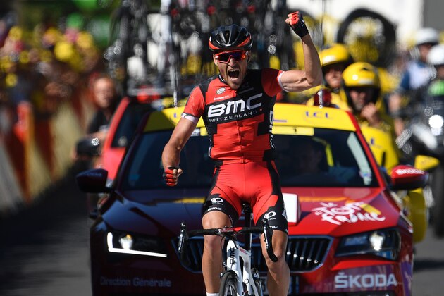 Belgium's Greg Van Avermaet celebrates as he crosses the finish line at the end of the 216 km fifth stage of the 103rd edition of the Tour de France cycling race on July 6, 2016 between Limoges and Le Lioran. / AFP / LIONEL BONAVENTURE        (Photo credit should read LIONEL BONAVENTURE/AFP/Getty Images)
