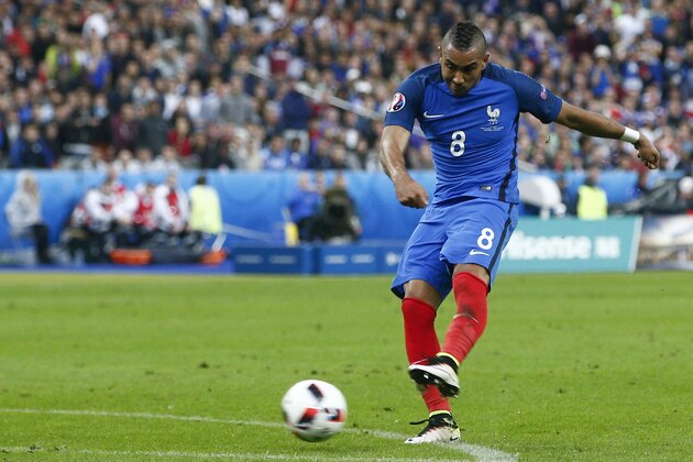 France's Dimitri Payet scores his side's third goal  during the Euro 2016 quarterfinal soccer match between France and Iceland, at the Stade de France in Saint-Denis, north of Paris, France, Sunday, July 3, 2016. (AP Photo/Thibault Camus)