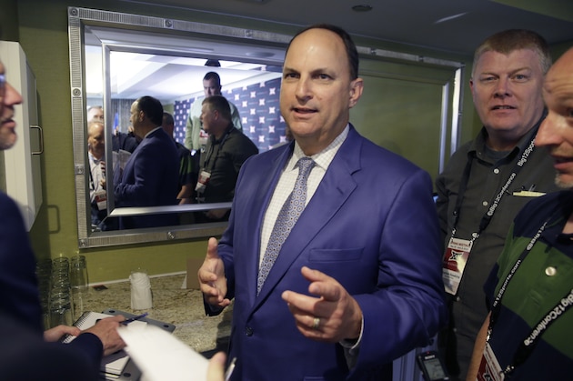 Oklahoma athletic director Joe Castiglione speaks to reporters after the first day of the Big 12 sports conference meeting in Irving, Texas, Wednesday, June 1, 2016. (AP Photo/LM Otero)