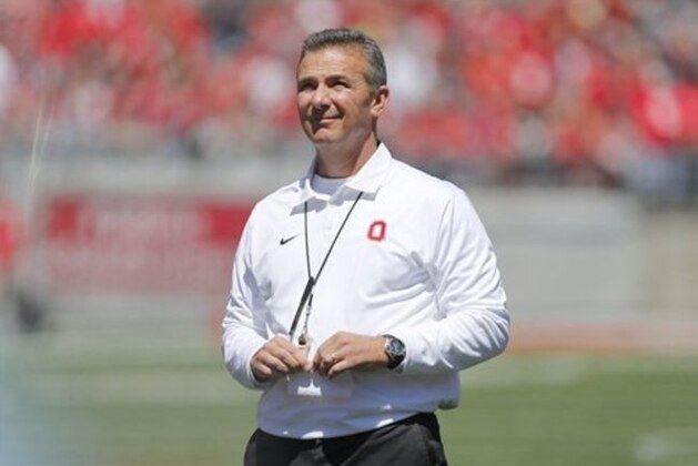 Ohio State head coach Urban Meyer watches Ohio State's NCAA college football spring game Saturday, April 16, 2016, in Columbus, Ohio. (AP Photo/Jay LaPrete)